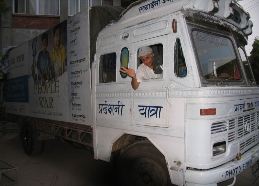 Kunda Dixit with the "People of War" Photo Exhibition Touring Truck - Travelling photo exhibition across the country in three phases in 2007-2009